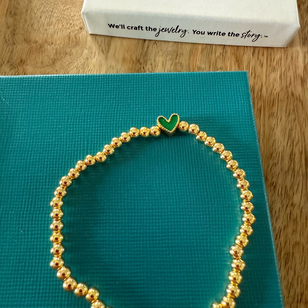 Gold Beaded Bracelet With Green Heart Charm